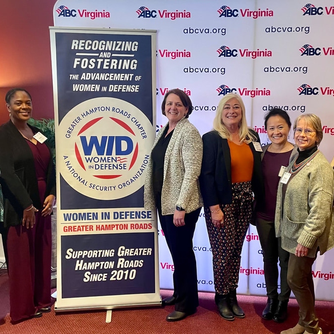 Five members of Greater Hampton Roads posing at a WID event